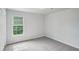 A simple carpeted bedroom with a window at 2268 Orleans Ave, Marietta, GA 30062