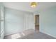 A bedroom featuring neutral walls, a ceiling light and a double-door closet at 2268 Orleans Ave, Marietta, GA 30062