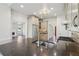 Bright kitchen with stainless steel appliances, granite counters and view into the living room and entry at 2268 Orleans Ave, Marietta, GA 30062