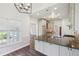 Beautifully updated kitchen with stainless steel appliances, light wood cabinets, and black countertops at 2268 Orleans Ave, Marietta, GA 30062