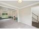 An open concept living room with carpet flooring and white trim at 2268 Orleans Ave, Marietta, GA 30062