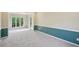 Spacious carpeted living room with bright windows and chair rail at 2268 Orleans Ave, Marietta, GA 30062