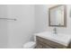 Modern bathroom featuring a vanity with sink, toilet, and stylish fixtures at 3031 Walker Dr, Marietta, GA 30062