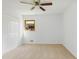 Comfortable bedroom with neutral walls, carpet flooring, a ceiling fan, and a closet at 3031 Walker Dr, Marietta, GA 30062