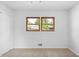 Bright bedroom with carpet flooring, closet space and windows providing natural light at 3031 Walker Dr, Marietta, GA 30062