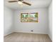 Well-lit bedroom with two windows providing great natural light and a ceiling fan at 3031 Walker Dr, Marietta, GA 30062