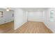 Spacious living room with hardwood floors, white walls, and large windows for natural light at 3031 Walker Dr, Marietta, GA 30062