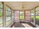 Cozy sunroom surrounded by windows and nature views at 3031 Walker Dr, Marietta, GA 30062