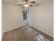 Clean bedroom with neutral colors and light, creating a cozy space at 6240 Shenfield Ln, Union City, GA 30291