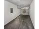 This is a view of the garage with automatic door opener, concrete floors, and door to the exterior at 6240 Shenfield Ln, Union City, GA 30291