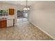 Cozy breakfast nook area in the kitchen, featuring a sliding glass door leading to the backyard at 6240 Shenfield Ln, Union City, GA 30291