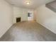 A cozy living room with a fireplace, perfect for relaxing and entertaining at 6240 Shenfield Ln, Union City, GA 30291