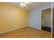 Bedroom with yellow and blue walls leading to the bathroom at 1249 Riva Ridge Dr, Norcross, GA 30093