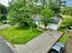 Charming one-story home features a well-manicured lawn and a driveway leading to an attached garage at 1249 Riva Ridge Dr, Norcross, GA 30093