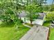 Charming single-story home with an attached garage, complemented by a well-maintained front yard and driveway at 1249 Riva Ridge Dr, Norcross, GA 30093