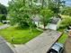 Charming one-story home features a well-manicured lawn and a driveway leading to an attached garage at 1249 Riva Ridge Dr, Norcross, GA 30093