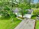 Charming single-story home with an attached garage, complemented by a well-maintained front yard and driveway at 1249 Riva Ridge Dr, Norcross, GA 30093