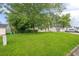 Well-maintained lawn and mature trees frame this charming single-story home's exterior at 1249 Riva Ridge Dr, Norcross, GA 30093