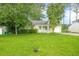 Well-maintained lawn and mature trees frame this charming single-story home's exterior at 1249 Riva Ridge Dr, Norcross, GA 30093