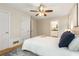 Serene bedroom features hardwood floors, a ceiling fan, and closet at 2880 Foothill Trl, Marietta, GA 30066