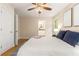 Bedroom featuring hardwood floors, ceiling fan, and ensuite bathroom at 2880 Foothill Trl, Marietta, GA 30066