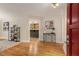 Bright entryway featuring hardwood floors, stylish console table, and an open view into the adjoining rooms at 2880 Foothill Trl, Marietta, GA 30066