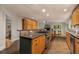 The modern kitchen has lots of counter space, stainless appliances, and custom cabinets at 2880 Foothill Trl, Marietta, GA 30066
