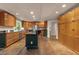 Large kitchen with wood cabinets, stainless appliances, a prep island, and plenty of storage at 2880 Foothill Trl, Marietta, GA 30066