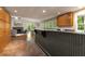View from the kitchen highlights an open floor plan, fireplace, and natural light at 2880 Foothill Trl, Marietta, GA 30066