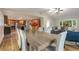 Bright, open living space with a spacious dining area and kitchen offering seamless entertaining possibilities at 2880 Foothill Trl, Marietta, GA 30066
