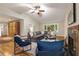 The living room showcases recessed lighting, a fireplace, and ample seating at 2880 Foothill Trl, Marietta, GA 30066