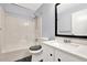 Bathroom with a shower/tub combo, white vanity, and modern fixtures at 5012 Galbraith Cir, Stone Mountain, GA 30088