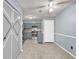 Charming kitchen with gray cabinets, stainless steel appliances, and neutral countertops at 5012 Galbraith Cir, Stone Mountain, GA 30088