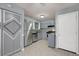 Kitchen with stainless steel appliances, gray cabinets, and neutral countertops at 5012 Galbraith Cir, Stone Mountain, GA 30088