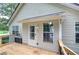 Wooden back deck with railings and view of yard at 121 Paradise Circle, Douglasville, GA 30134