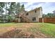 The backyard of this home is spacious and features a wooden fence for privacy at 121 Paradise Circle, Douglasville, GA 30134