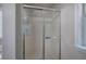 Bathroom featuring shower with glass doors and a soaking tub at 121 Paradise Circle, Douglasville, GA 30134