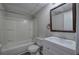Bathroom featuring tub with shower, modern vanity, and tiled floors at 121 Paradise Circle, Douglasville, GA 30134