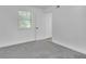 Bright bedroom with neutral walls and window with view at 3706 Londonderry Ct, Lithonia, GA 30038