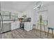 Bright kitchen featuring stainless steel appliances, white cabinets, and stylish countertops at 3706 Londonderry Ct, Lithonia, GA 30038