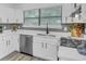 Modern kitchen with stainless steel appliances and ample counter space at 3706 Londonderry Ct, Lithonia, GA 30038