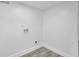 Empty laundry room with hookups ready for appliances at 3706 Londonderry Ct, Lithonia, GA 30038
