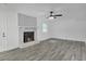 Spacious living room featuring a fireplace and tile flooring at 3706 Londonderry Ct, Lithonia, GA 30038