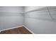 This is a walk-in closet with hardwood floors and a wire shelving unit at 856 Bridgewater Sw St, Atlanta, GA 30310