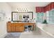 Spacious bathroom features a large vanity, soaking tub, and a well-lit mirror at 2214 Trilleck Nw Dr, Kennesaw, GA 30152