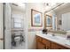 Well-lit bathroom with a vanity and toilet; showcasing a clean and tidy space at 2214 Trilleck Nw Dr, Kennesaw, GA 30152