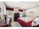 Cozy bedroom featuring a ceiling fan and natural light from the window at 2214 Trilleck Nw Dr, Kennesaw, GA 30152