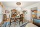 Charming dining area featuring hardwood floors, chandelier lighting, and classic decor at 2214 Trilleck Nw Dr, Kennesaw, GA 30152