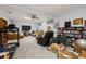 Spacious living room with a ceiling fan and built-in shelves at 2214 Trilleck Nw Dr, Kennesaw, GA 30152