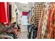 Organized walk-in closet with shelves and hanging racks, maximizing storage space in the home at 2214 Trilleck Nw Dr, Kennesaw, GA 30152